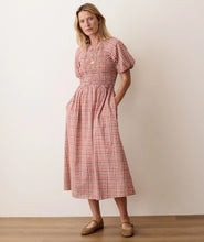 Load image into Gallery viewer, Woman is standing wearing a plaid dress.