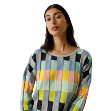 Load image into Gallery viewer, Woman wearing a colorful checkered sweater on a white background
