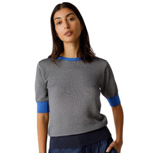 Load image into Gallery viewer, Woman wearing a gray and blue striped sweater with wide-leg navy pants on a white background

